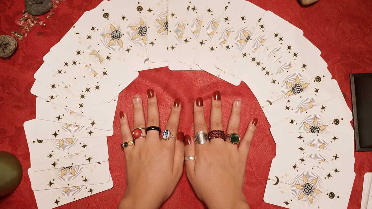 love reading: hands holding tarot cards illustration